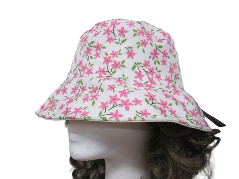 Floral-patterned bucket hat on a mannequin head against a neutral background